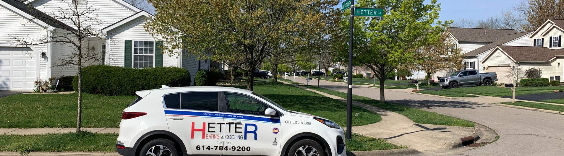 Picture of Hetter Heating vehicle on street in summer